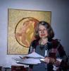 Odin administrator and artist Dorthe Kaergaard and one of her paintings that were exhibited during the festival