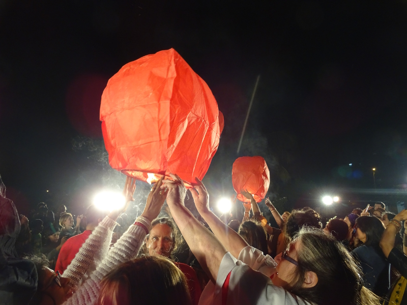 Launching fire lanterns at the festival opening.